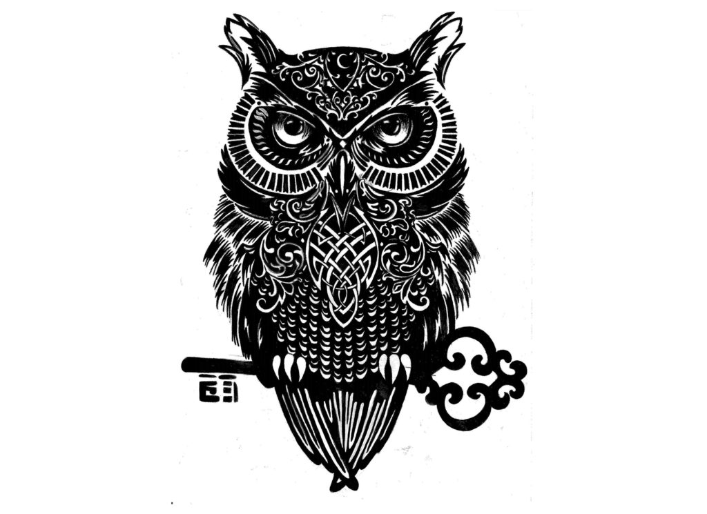 An owl artwork in black standing on a Key